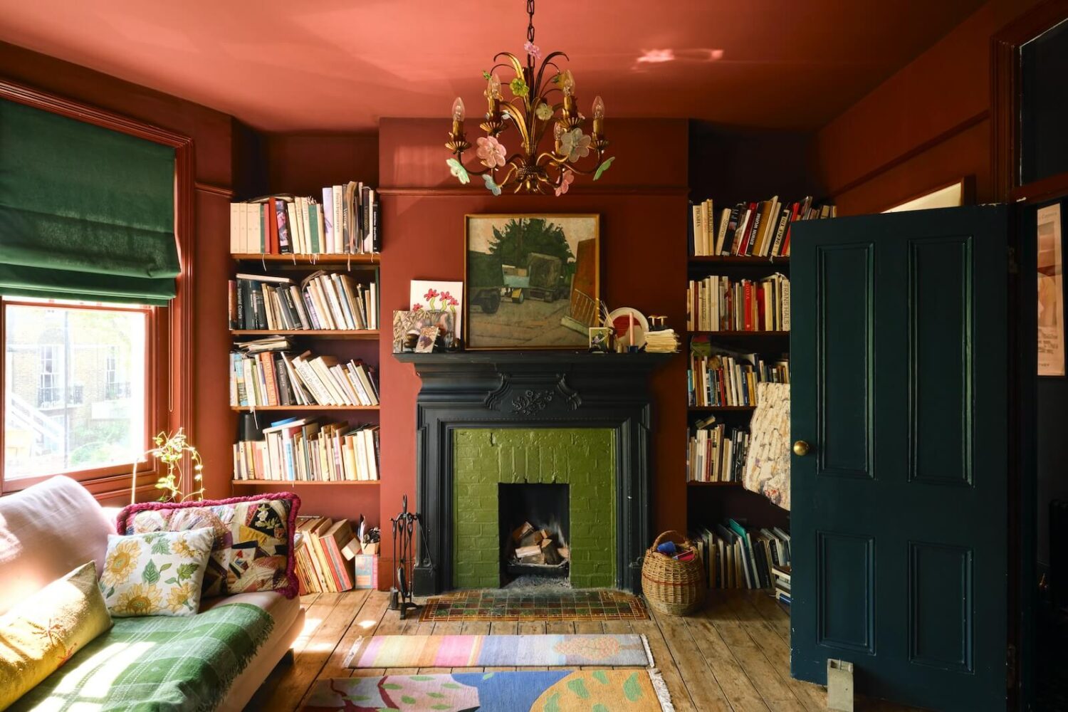 Bold Colors and Historic Details in a Victorian Apartment 1 living-room-deep-reddish-brown-farrow-ball-walls-green-firpelace-bookshelves-nordroom