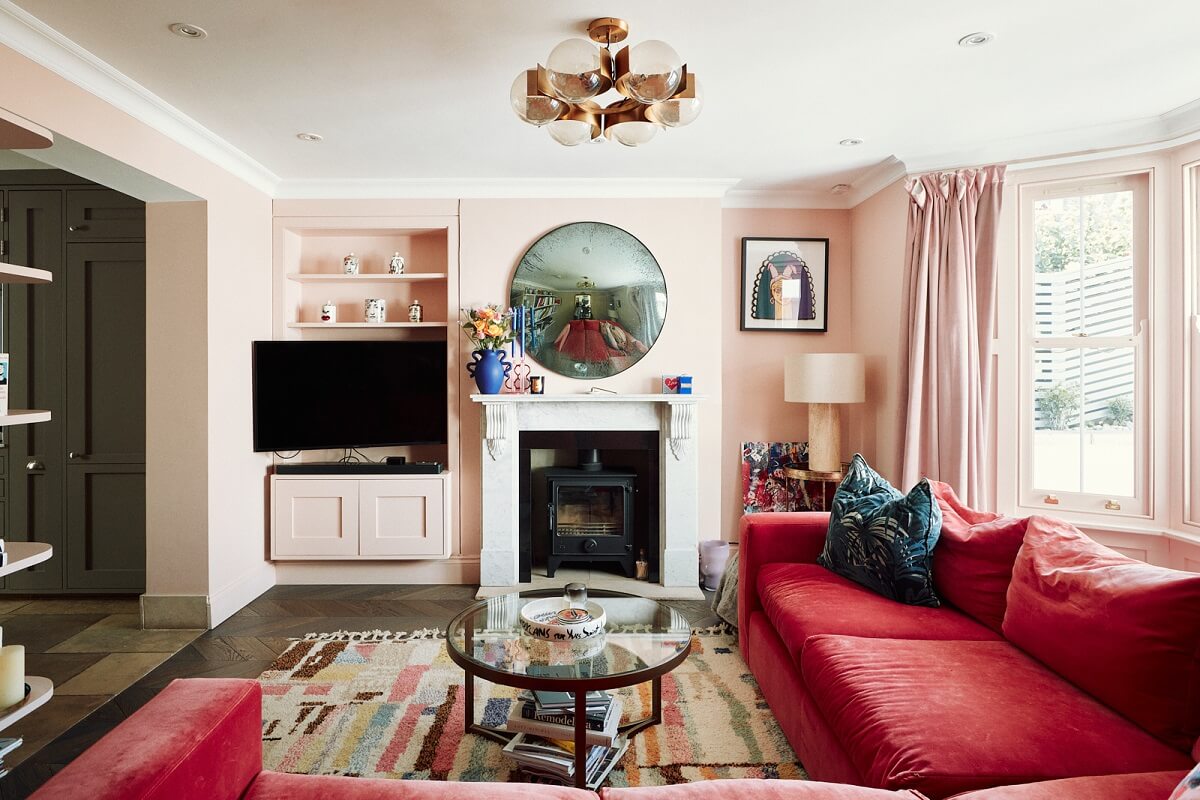 A Pink Living Room in a London Maisonette 3 living-room-light-pink-walls-dark-pink-couch-nordroom