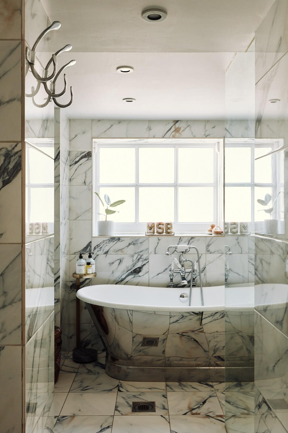A Pink Living Room in a London Maisonette 16 marble-bathroom-nickel-slipper-bath-nordroom