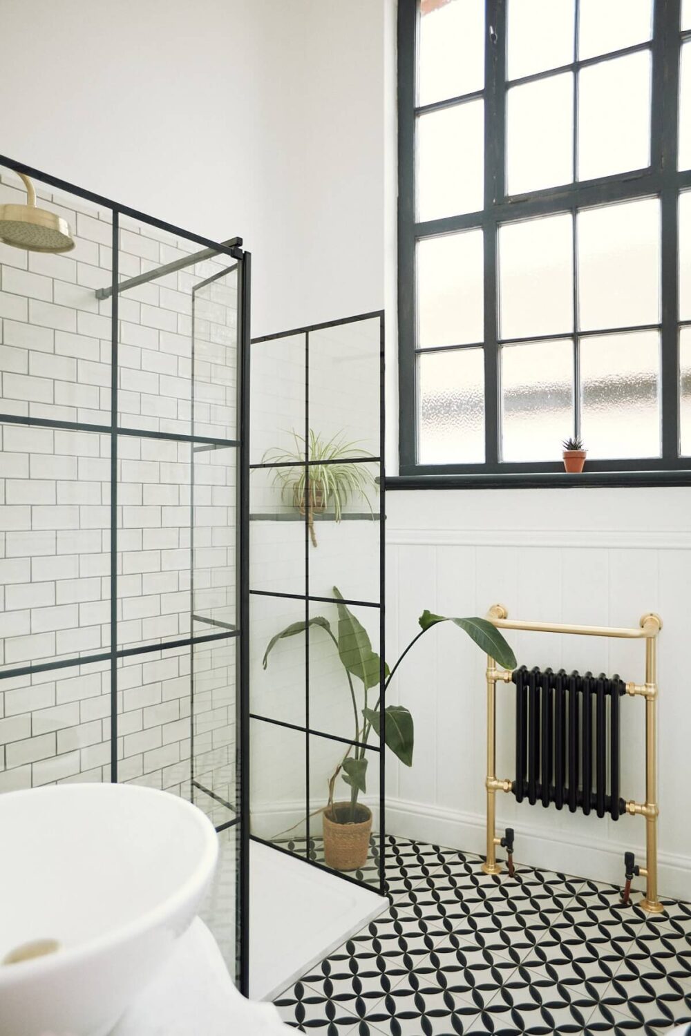Loft Style Spaces in a Renovated Salvation Army Hall 16 bathroom-high-ceiling-black-white-floor-tiles-steel-glass-shower-wall-nordroom