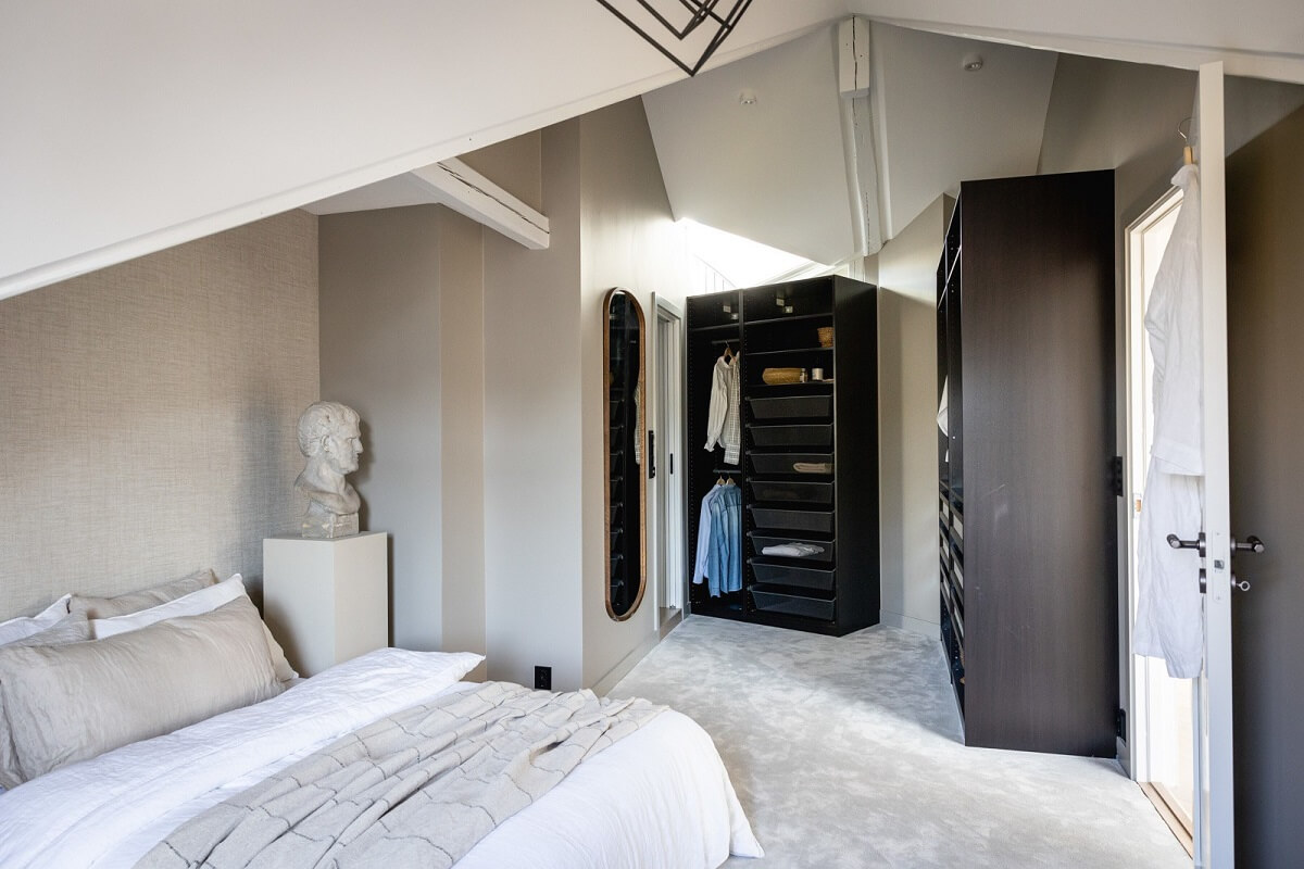 A Bright Penthouse Apartment in Oslo 12 bedroom-slanted-ceiling-open-wardrobes-nordroom