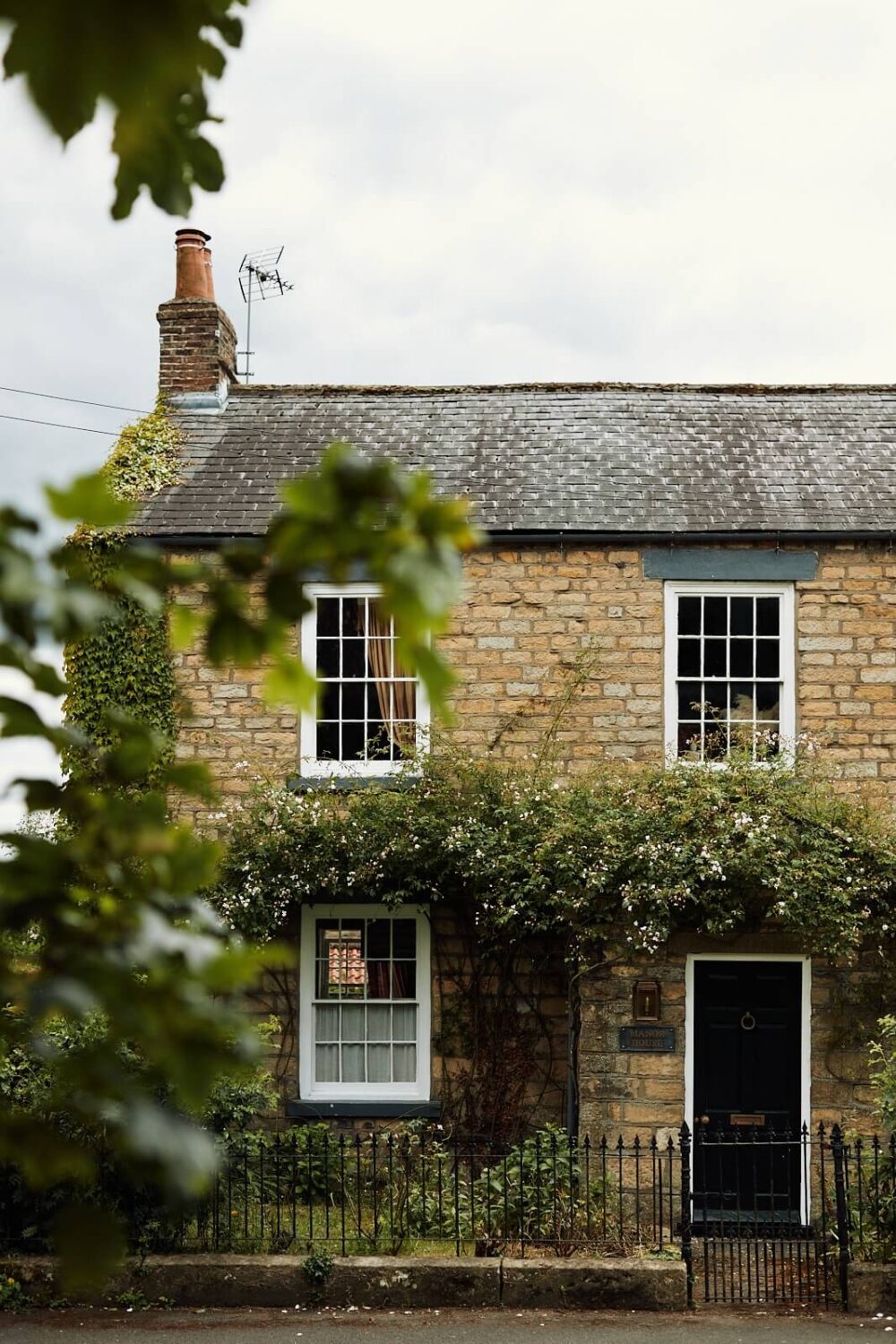 An English Cottage with a Perfect Kitchen 29 climbing-roses-english-cottage-nordroom