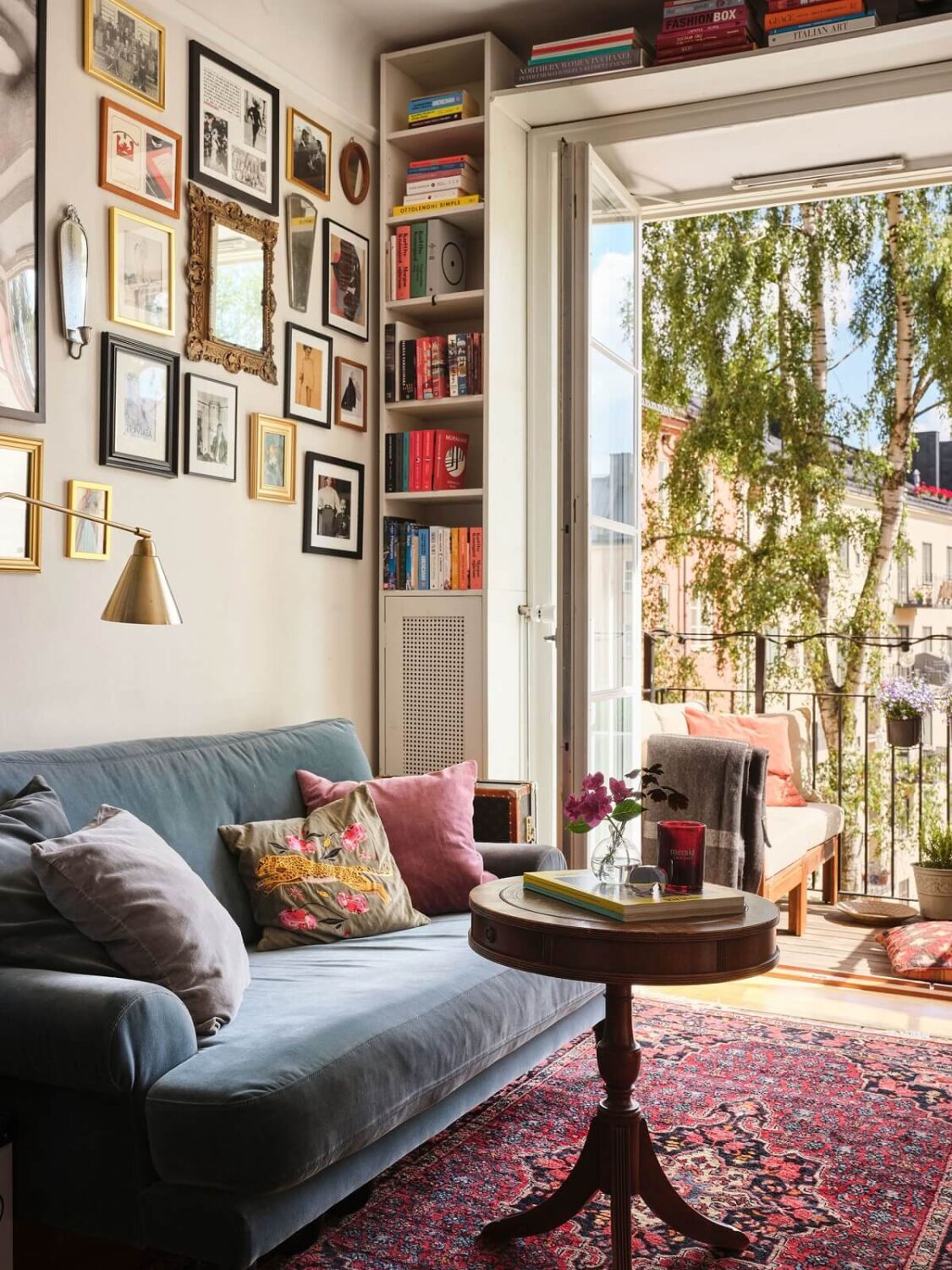 10 Affordable U.S. Cities to Live Alone in 2026, According to the Carrie Bradshaw Index 5 small-french-style-living-space-bookcases-balcony-nordroom