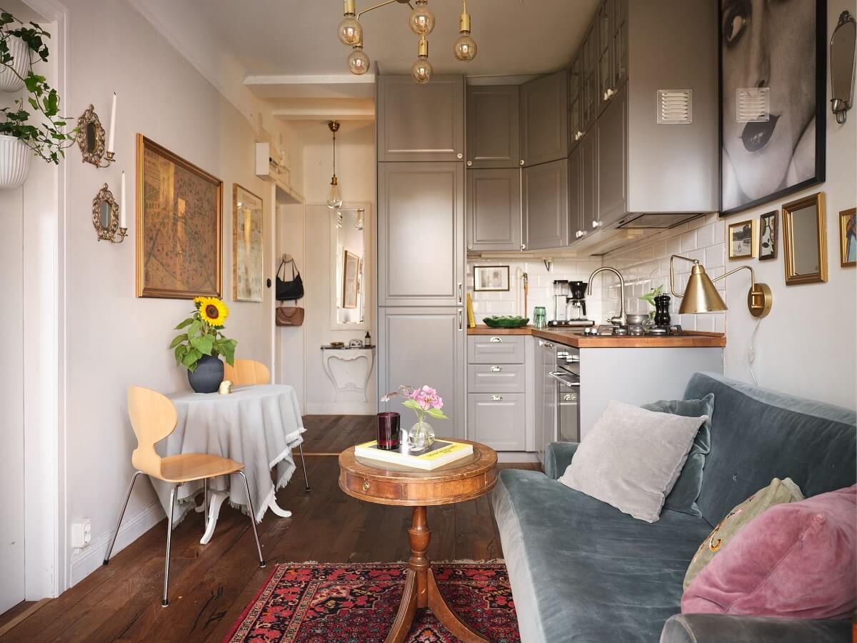 A Small Studio with a French Style Sitting Area 3 studio-apartment-light-gray-kitchen-nordroom