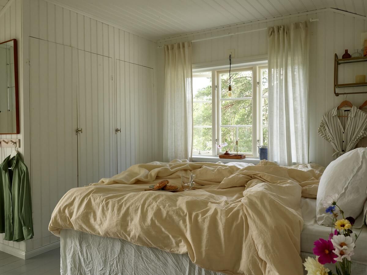 A Small Historic Swedish House with a Modern Extension 24 bedroom-serene-color-palette-historic-house