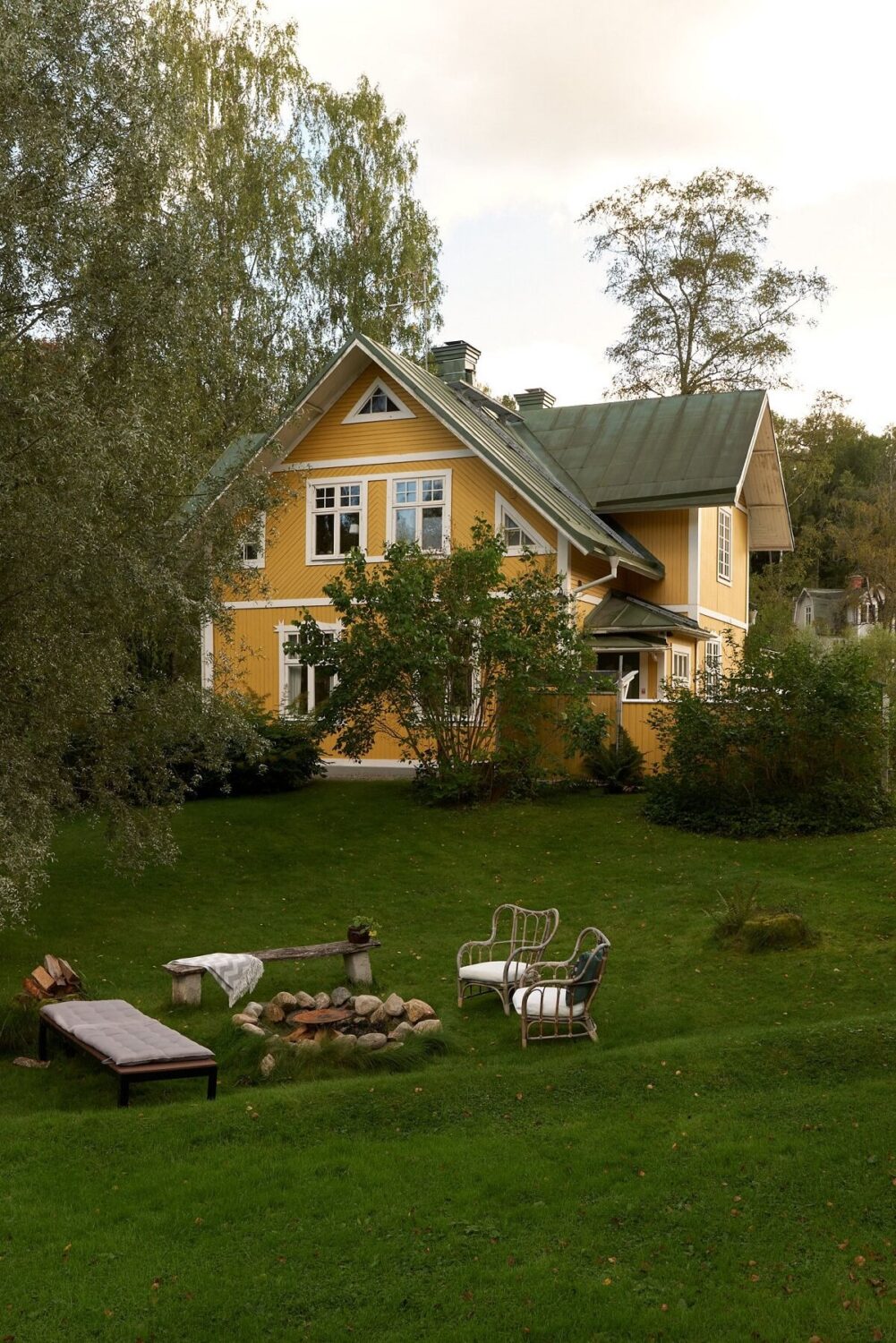 A Beautiful Swedish Country House with a Large Garden 38 fire-pit-garden-yellow-swedish-house-nordroom