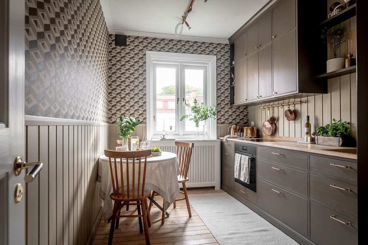 A Serene Studio Apartment with a Brown Kitchen 9 kitchen-geometric-wallpaper-brown-cabinets-nordroom