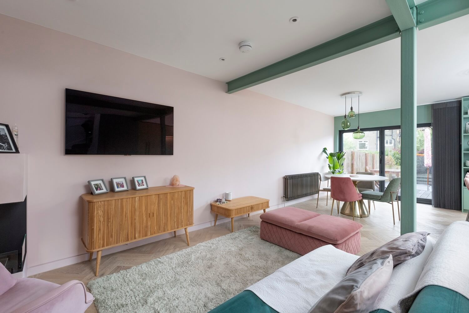 An Open-Plan Living and Kitchen in Green and Pink Tones 11 living-room-pink-green-color-palette-nordroom