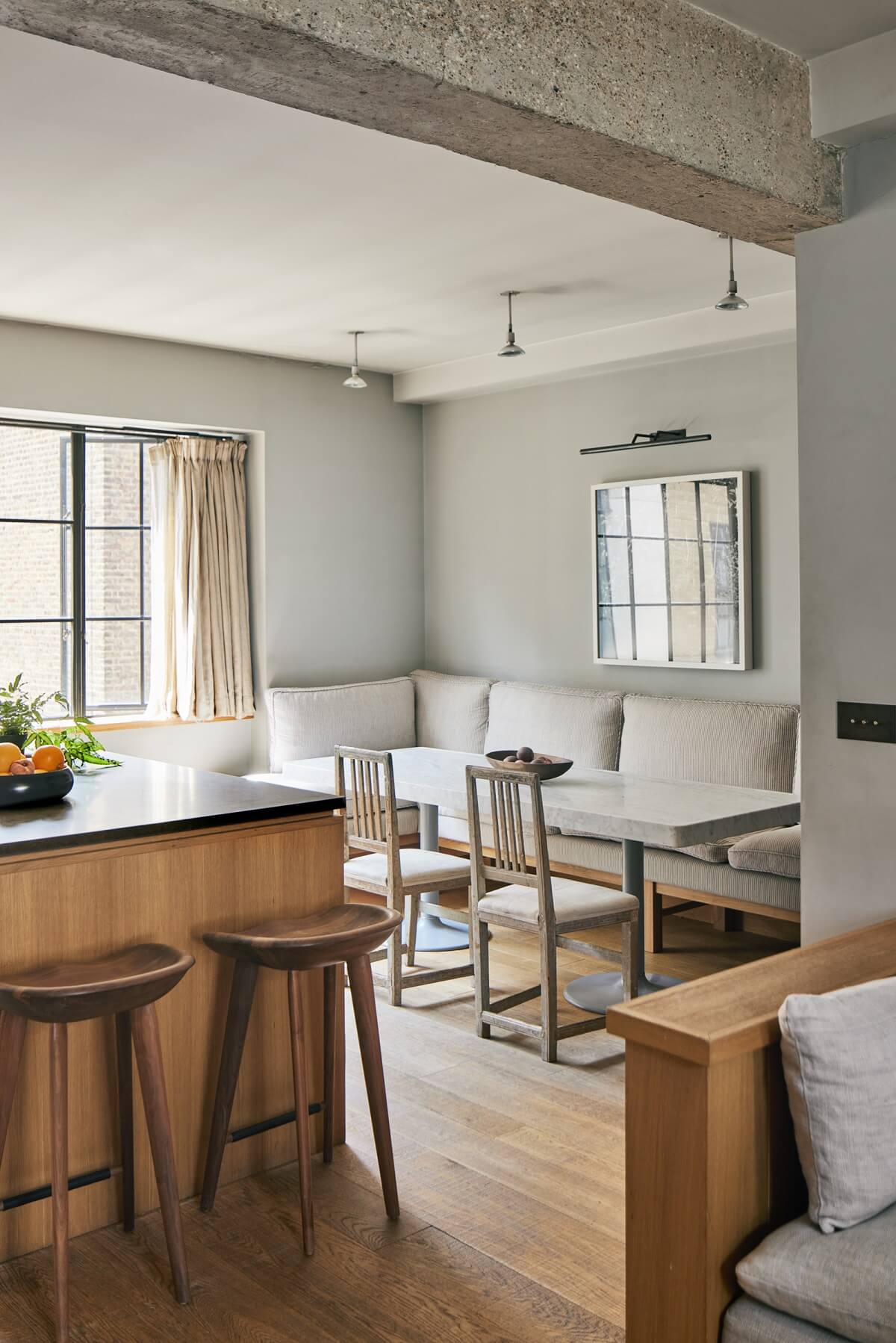 open-plan-living-room-kitchen-with-dining-table-custom-built-in-bench-nordroom