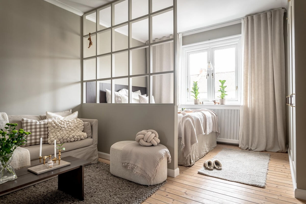 A Serene Studio Apartment with a Brown Kitchen 1 serene-light-colored-studio-apartment-nordroom