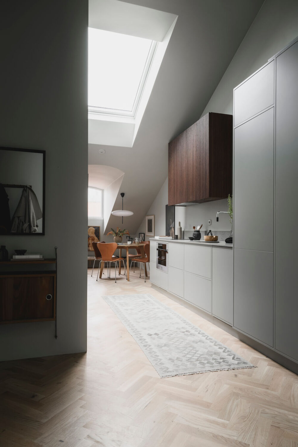 A Stylish Modern Gray Attic Apartment 13 gray-wood-scandinavian-kitchen-wooden-floor-nordoom