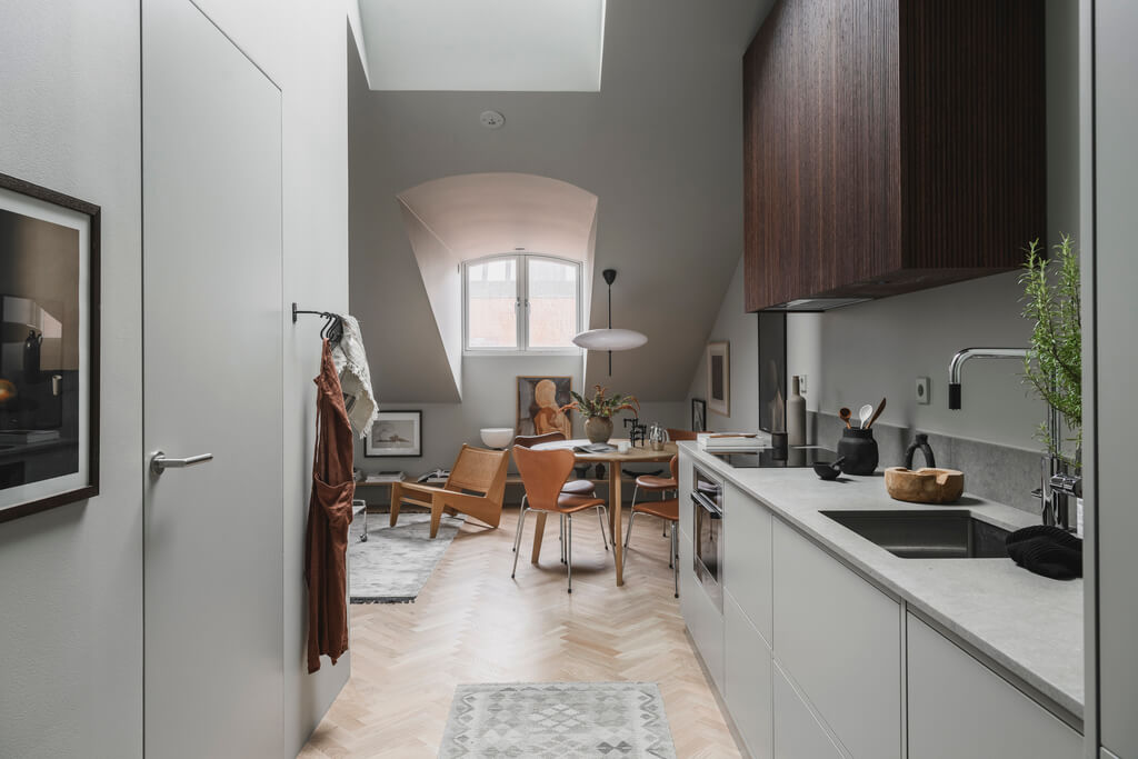 A Stylish Modern Gray Attic Apartment 10 open-plan-kitchen-living-space-attic-apartment-nordroom