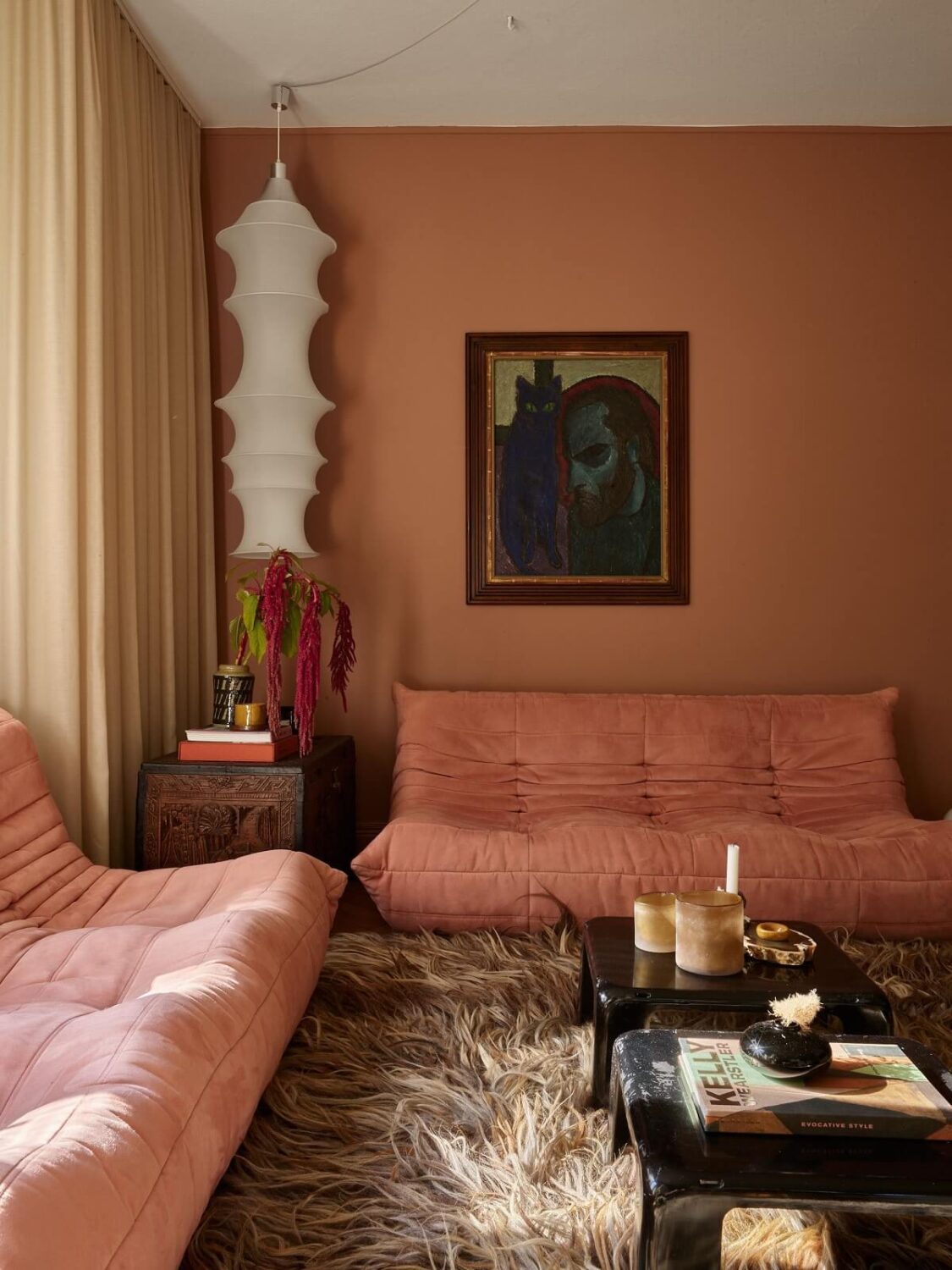 Warm Pink Tones in A Stockholm Apartment 2 warm-pink-living-room-large-rug-nordroom