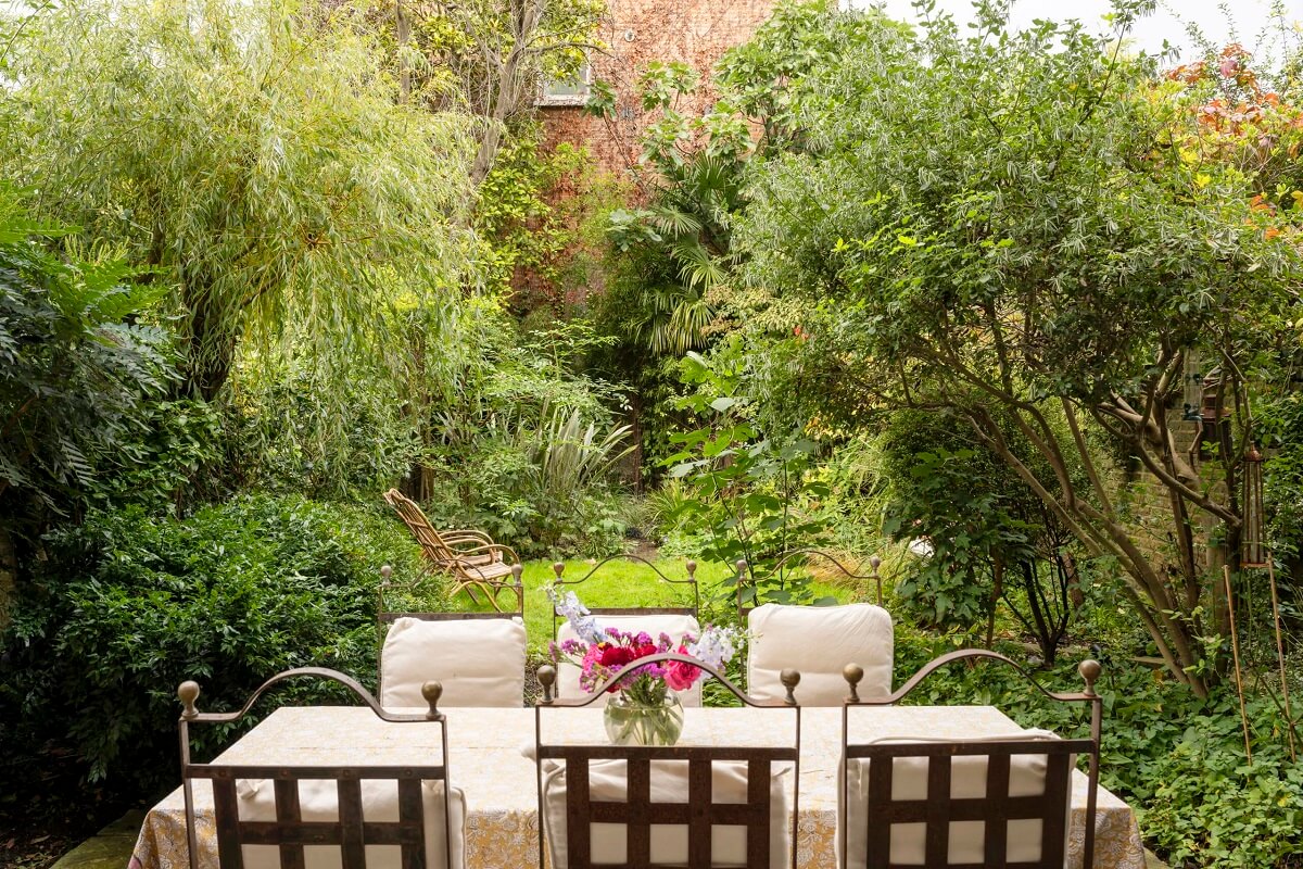 Best of 2023: Outdoor Spaces 21 green garden with dining table london flat nordroom
