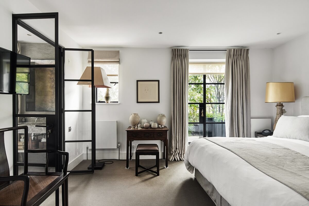 Stylish Monochrome Interiors in an Early 20th Century House 17 master-bedroom-steel-glass-doors-nordroom