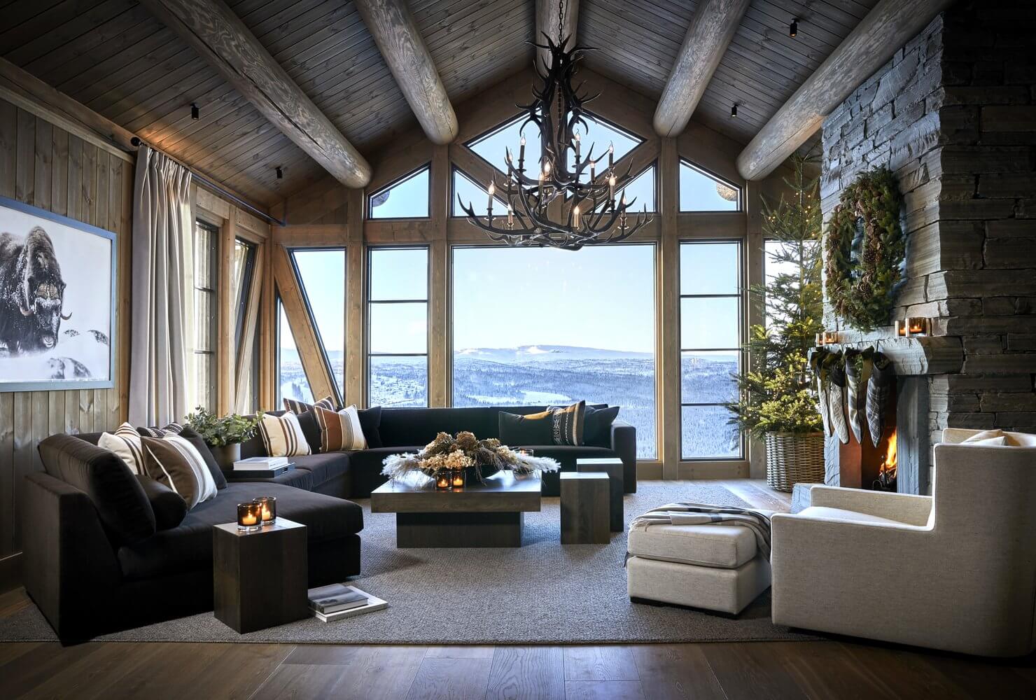 A Modern Norwegian Log House Decorated for Christmas 1 norwegian log home living room pitched ceiling christmas decor stone fireplace nordroom