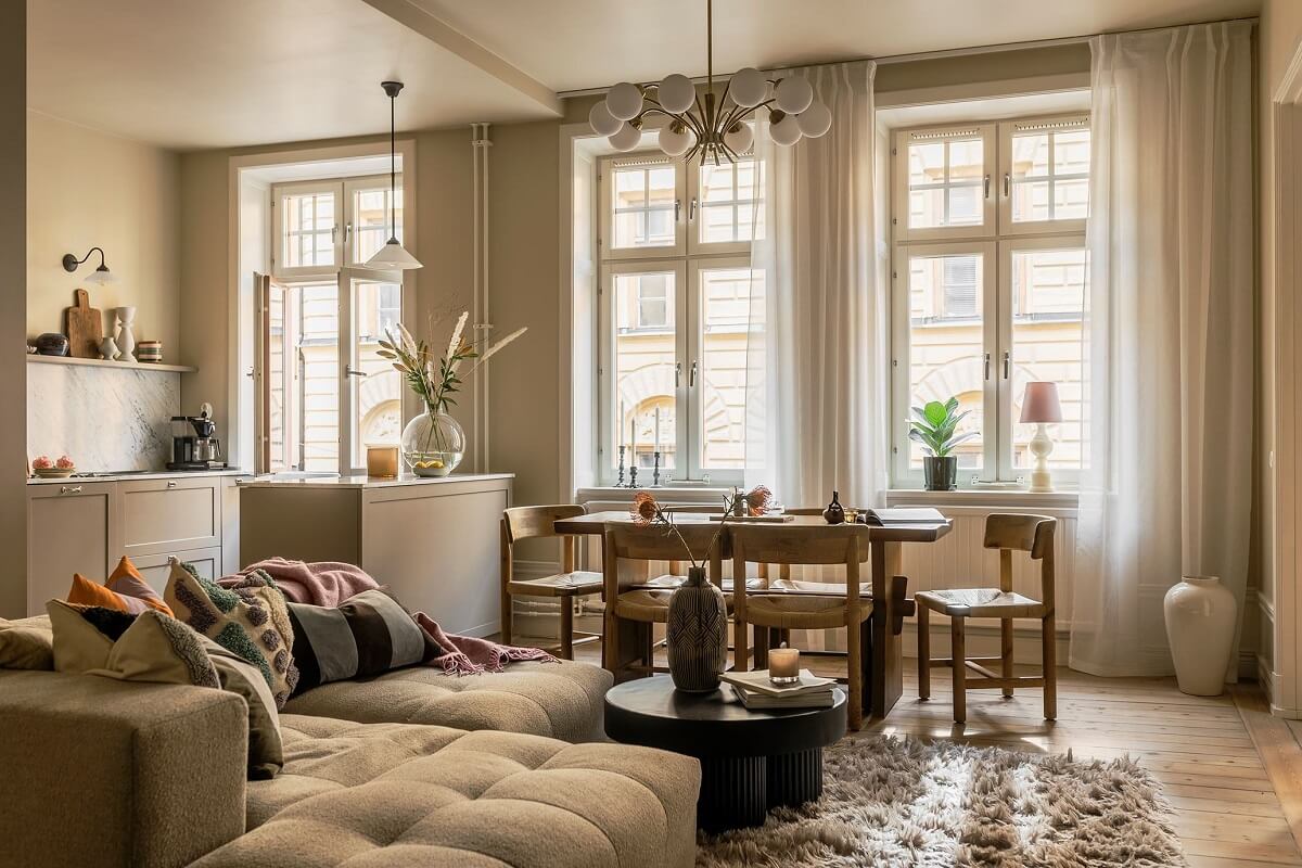 A Cozy Scandinavian Apartment with a Cobalt Color Accent 2 open plan living room kitchen scandinavian design