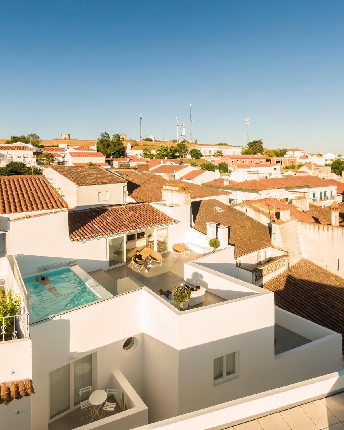 A Renovated 19th Century House with a Minimalistic Decor 16 roof-terrace-swimming-pool-portugal-nordroom