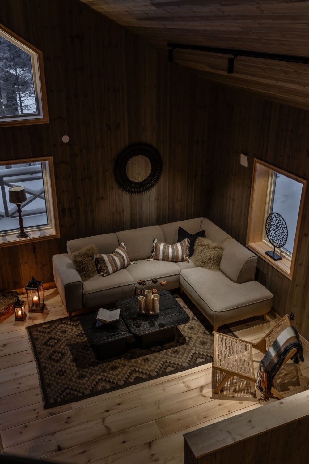 A Cozy Log House in Sweden 1 cozy-log-house-living-room-at-night-scandinavian-style-nordroom