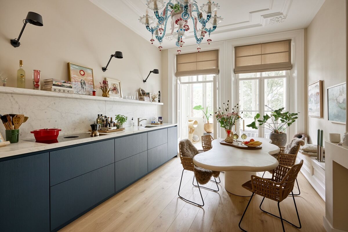 A Light Historic House in Amsterdam 1 kitchen-blue-cabinets-wavy-dining-table-nordroom