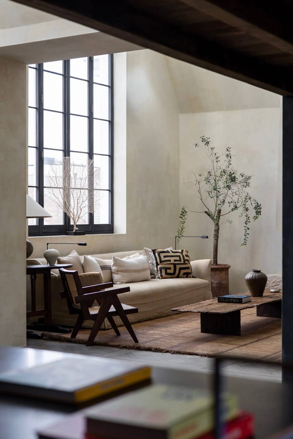 Best of 2023: Living Rooms 43 modern-rustic-living-room-notting-hill-apartment-high-ceilings-nordroom