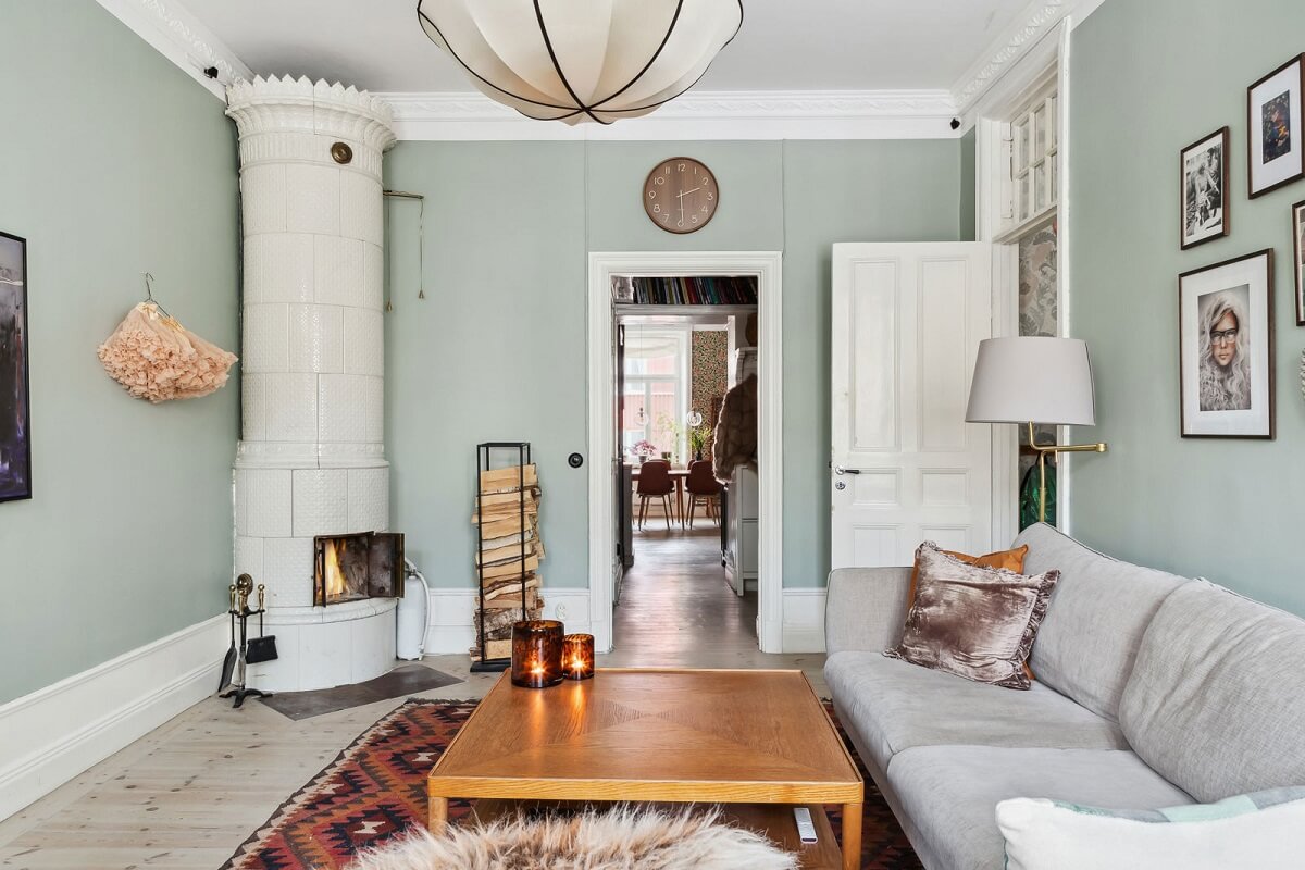 A Swedish Apartment with a Lovely Kitchen 8 light-scandinavian-living-room-round-fireplace-nordroom