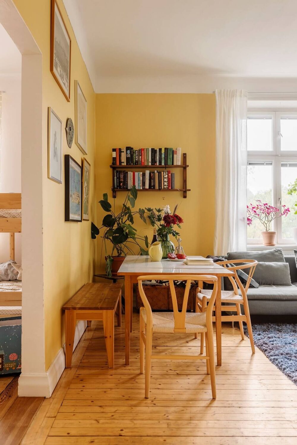Best of 2024: Living Rooms 32 living room dining table wooden floor yellow walls nordroom