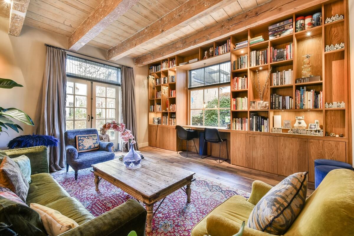 Wooden Interiors in a Historic Dutch Family Home 1 wooden-living-room-built-in-bookcases-desk-under-window-nordroom