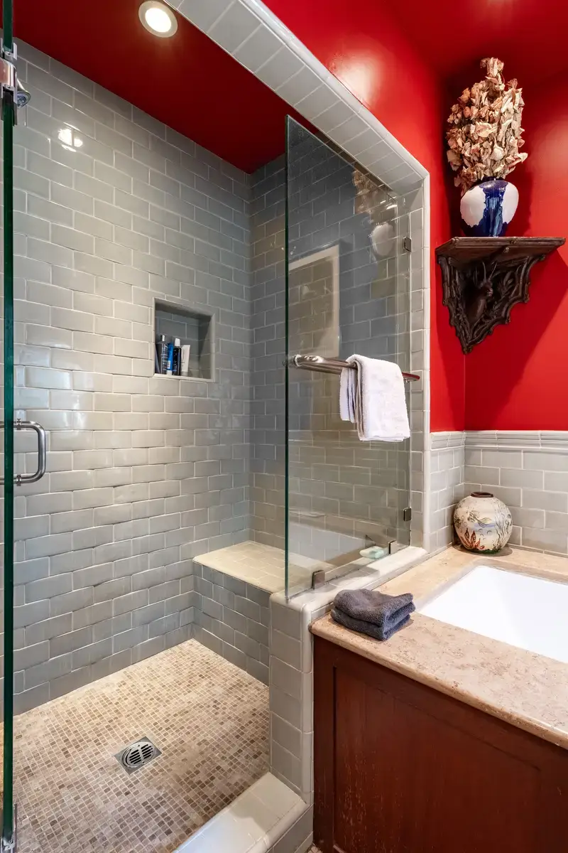 Rufus Wainwright's Colorful Laurel Canyon Home 10 blue-tiles-shower-red-walls-nordroom