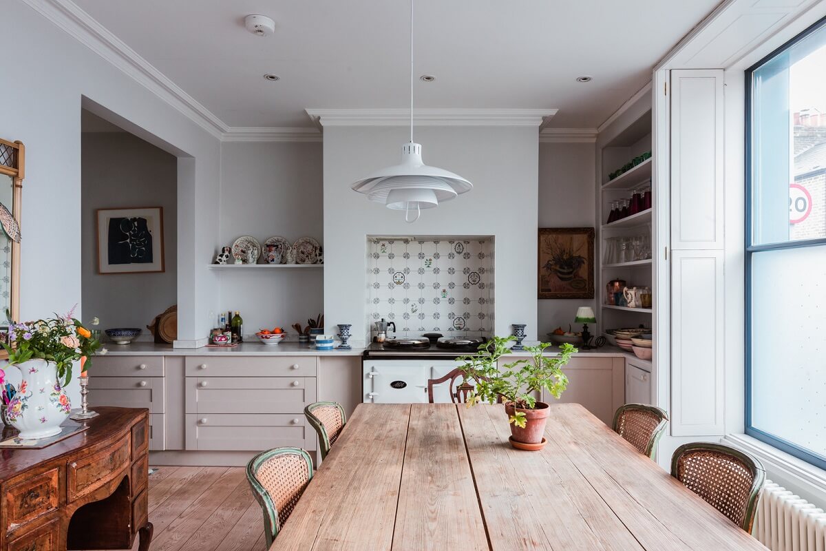 A Home with Cottage Interiors in a Former Cambridge Shop 1 kitchen with rustic wooden table