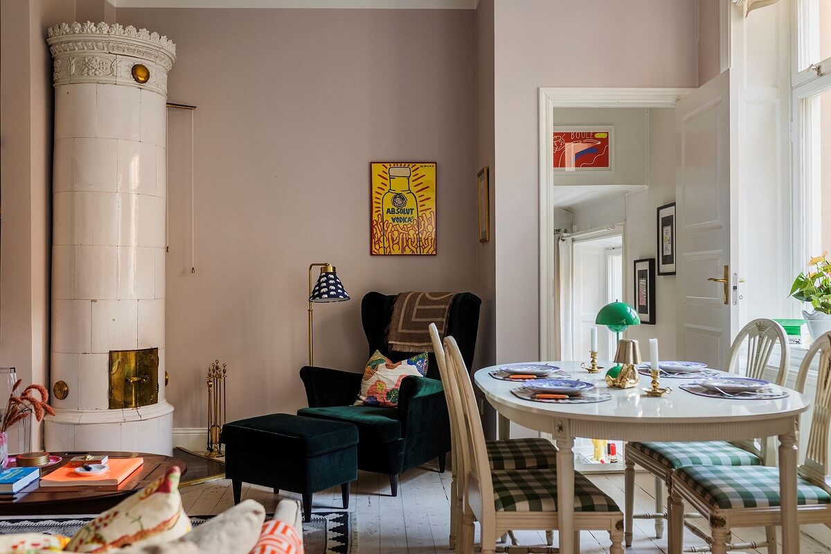A Small Split-Level Apartment in Stockholm 1 small living room light gray walls and fireplace nordroom