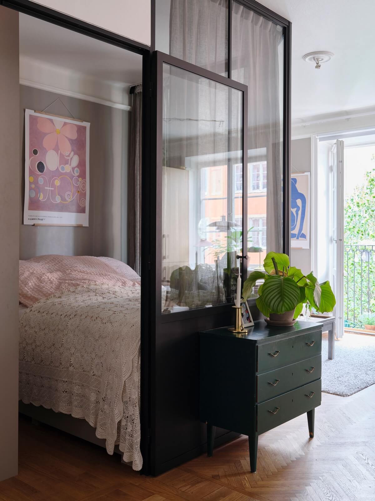 bedroom created with industrial glass walls nordroom