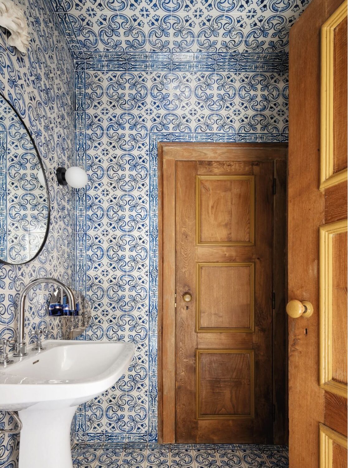 A Renovated Pink Manor House in Portugal 10 blue tiled bathroom manor house portugal nordroom