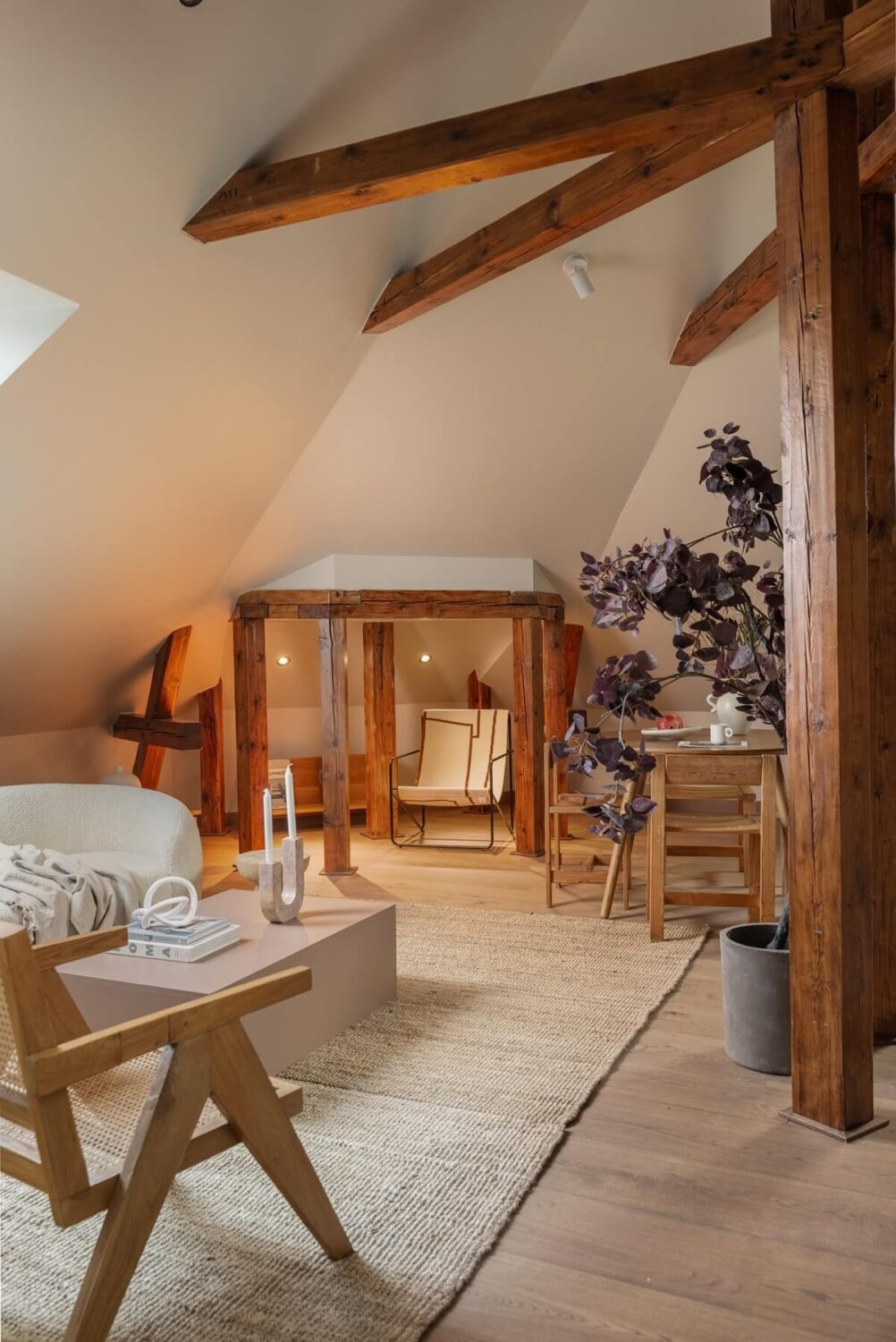 An Attic Apartment in Oslo with Exposed Wooden Beams 5 exposed wooden beams in living room