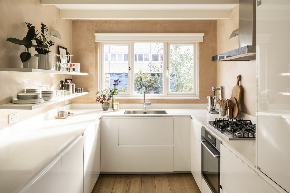 A Modern London Home with Plaster Walls 10 light modern white kitchen