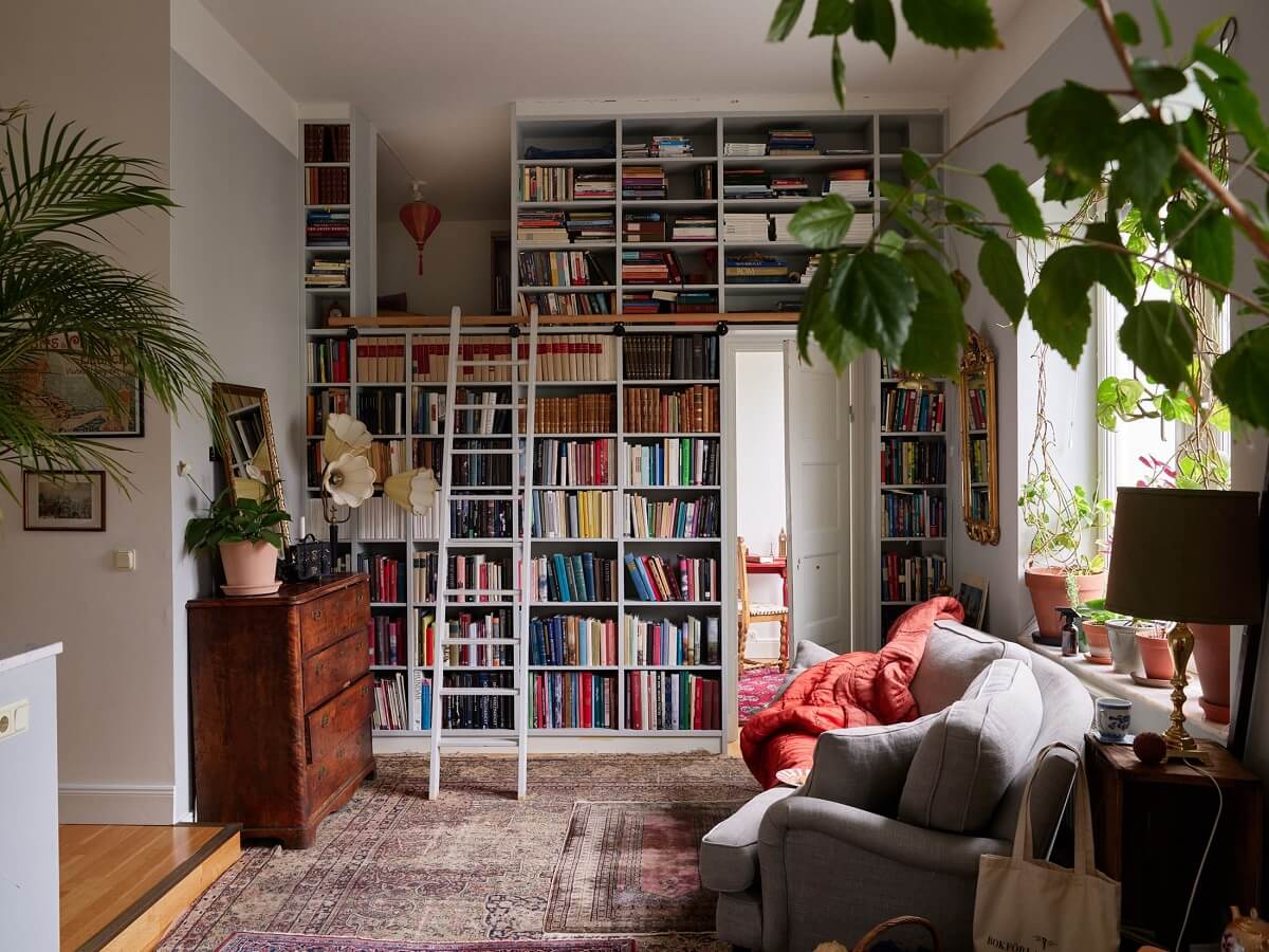 Floor-to-Ceiling Bookcases in a 1950s Swedish Home 1 living room with floor to ceiling bookcases