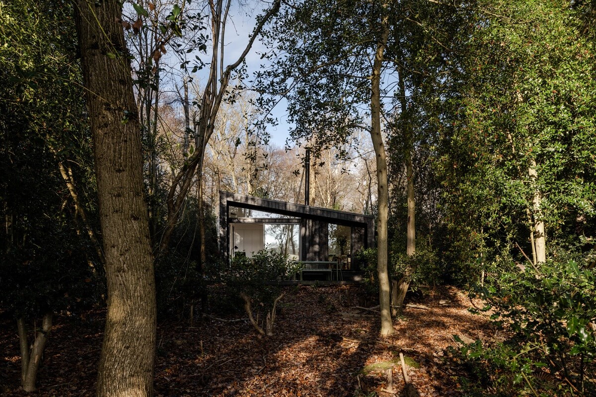 A Scandinavian-Inspired Cabin in the Woods 1 modern black cabin in the woods nordroom