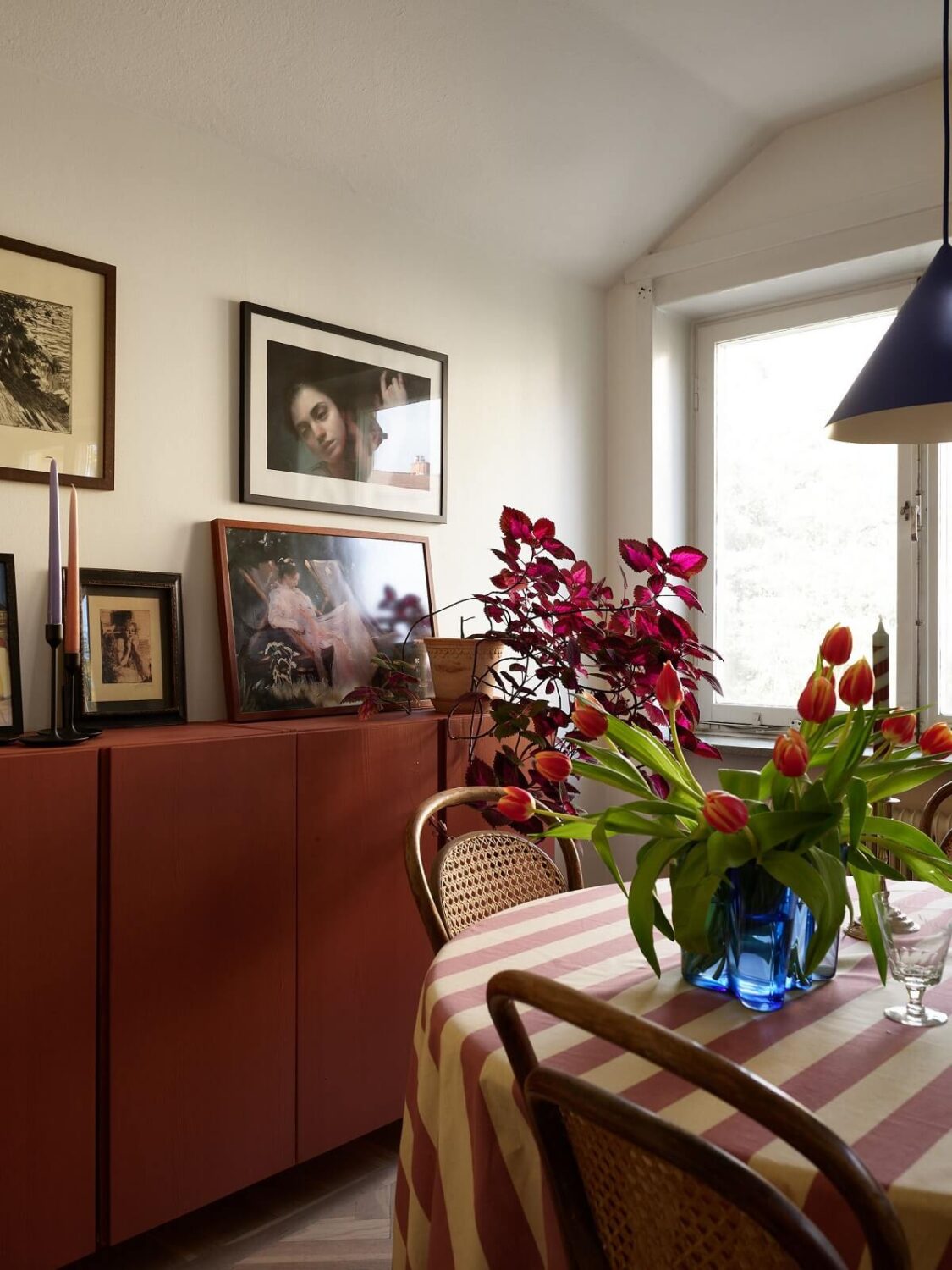 A Small Attic Apartment with a Golden Yellow Bedroom 9 red painted ikea ivar cabinets