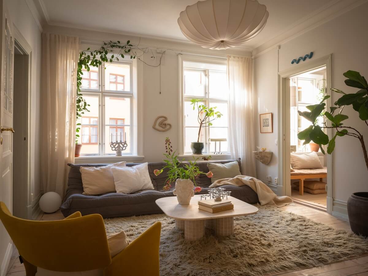 Light Rooms and Soft Color Tones in a Swedish Apartment 1 serene living room with large rug