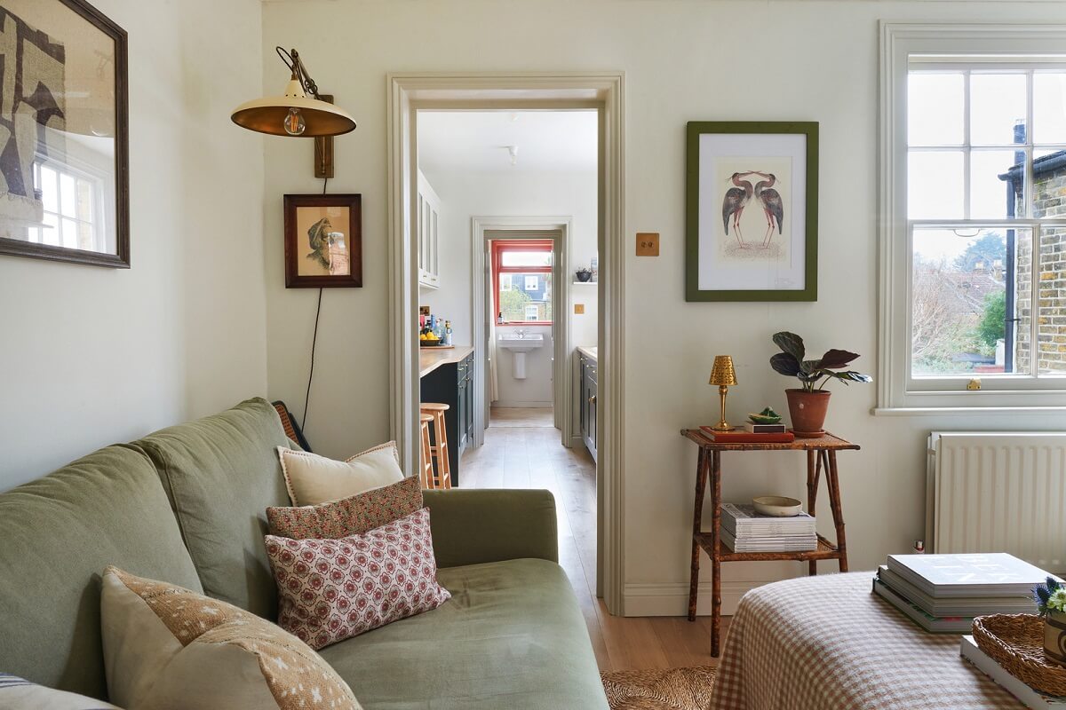 A Small Cottage-Style Apartment in London 1 small living room with green sofa