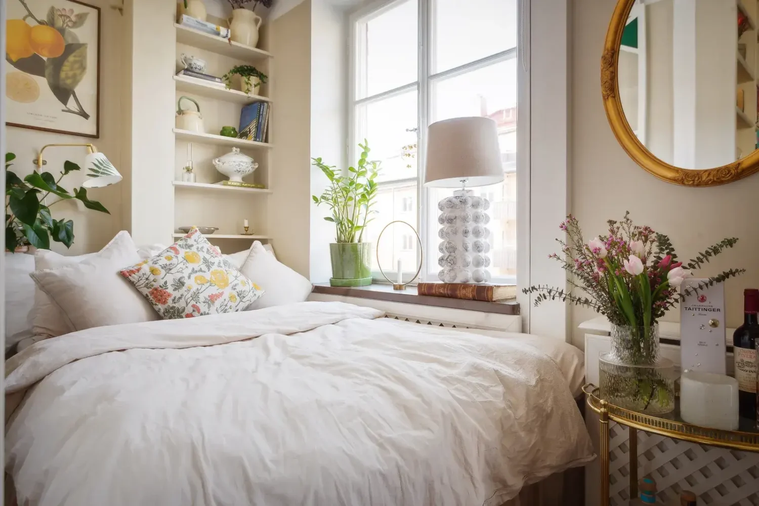 A Swedish Studio Apartment Decorated in a Classic Style 8 studio bed nook with built in shelves A Swedish Studio Apartment Decorated in a Classic Style
