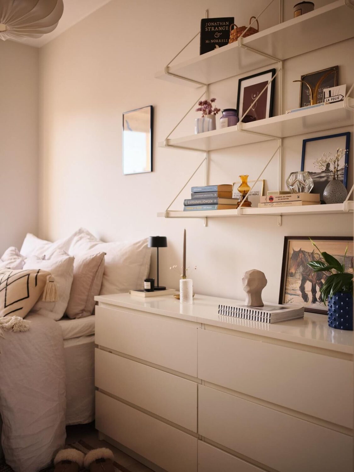 A Small Midcentury Apartment in Stockholm 10 white malm dressers with shelves