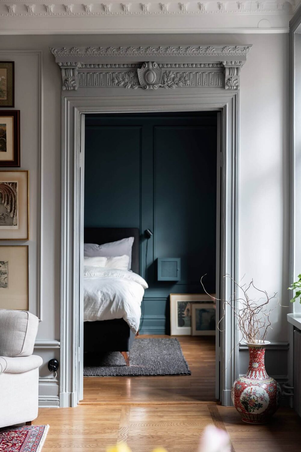 A Classic Swedish Apartment with a Dark Blue Bedroom 11 dark blue living room