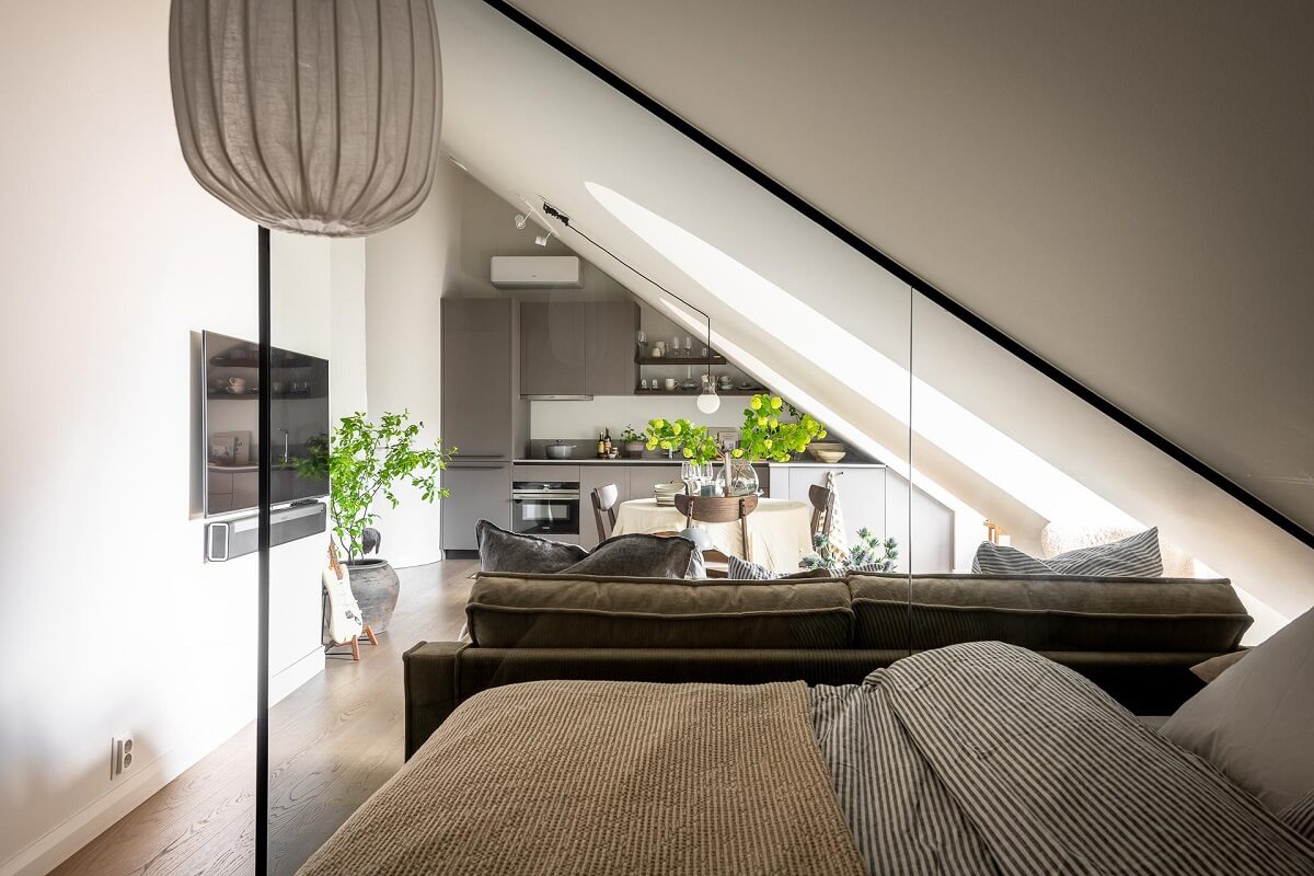 An Attic Studio Apartment with a Glass Room Divider 7 glass room divider studio apartment