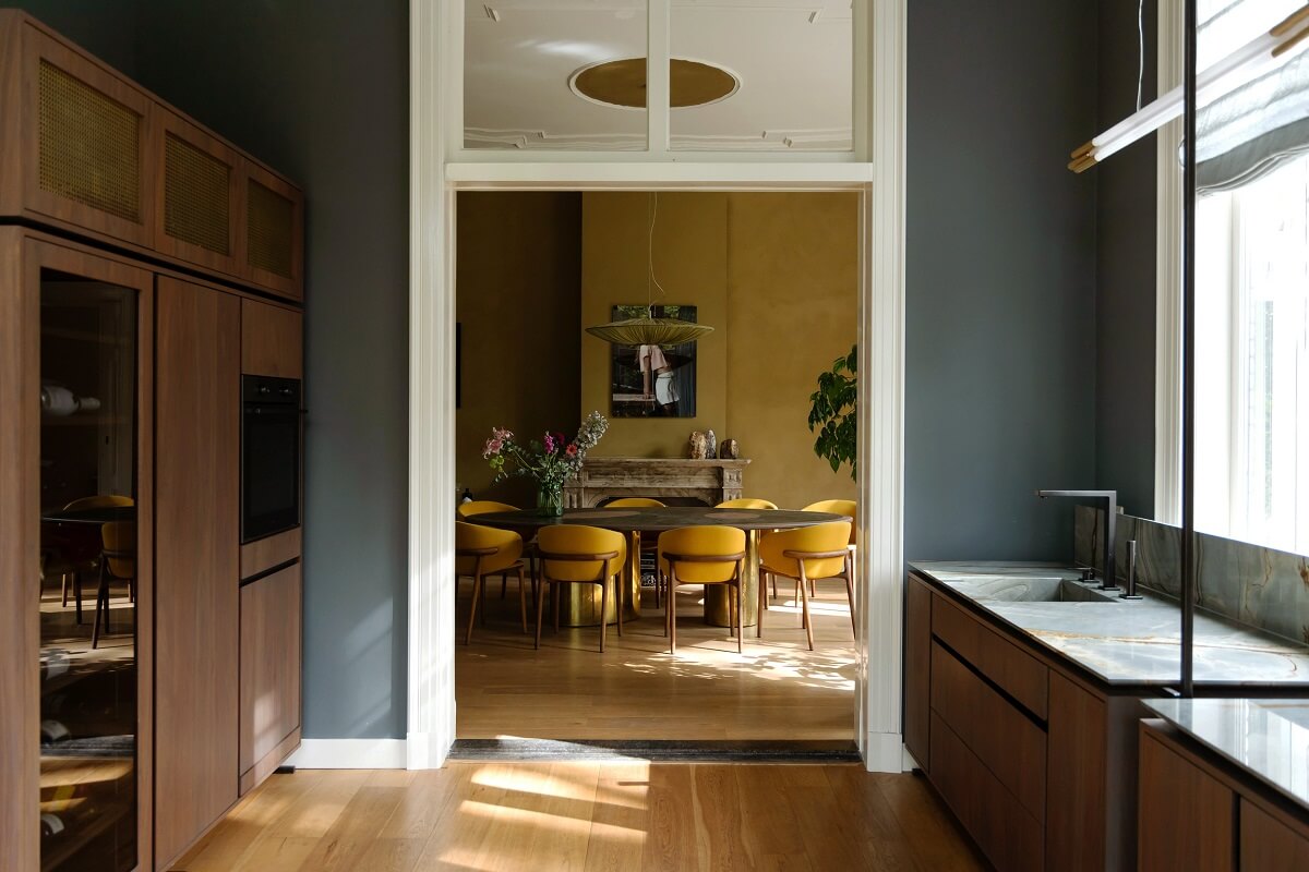 A Warm Atmosphere in a Historic Dutch Villa 8 kitchen with walnut cabinets