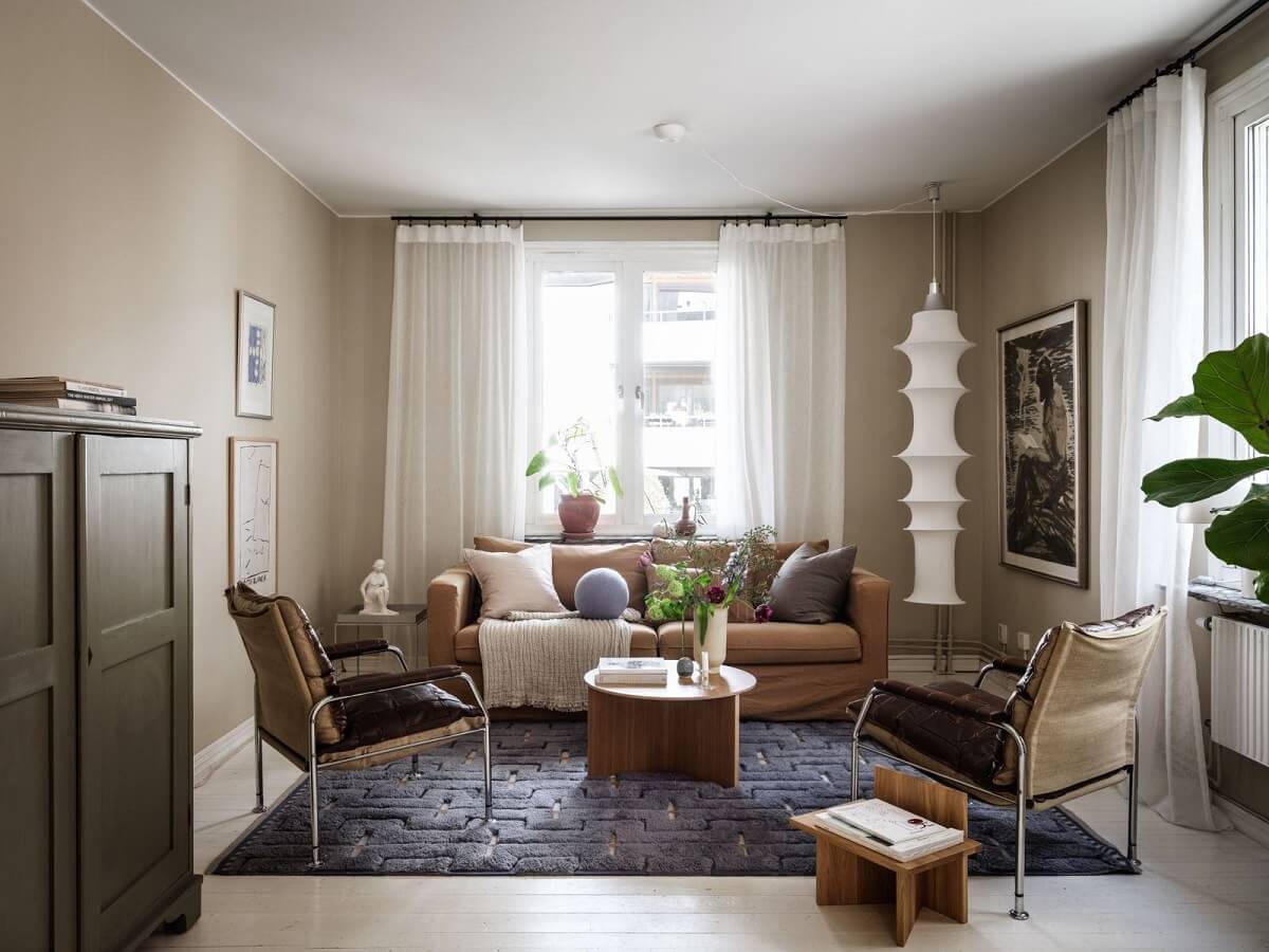 A Scandinavian Apartment with a Rust Red Bedroom 1 living room