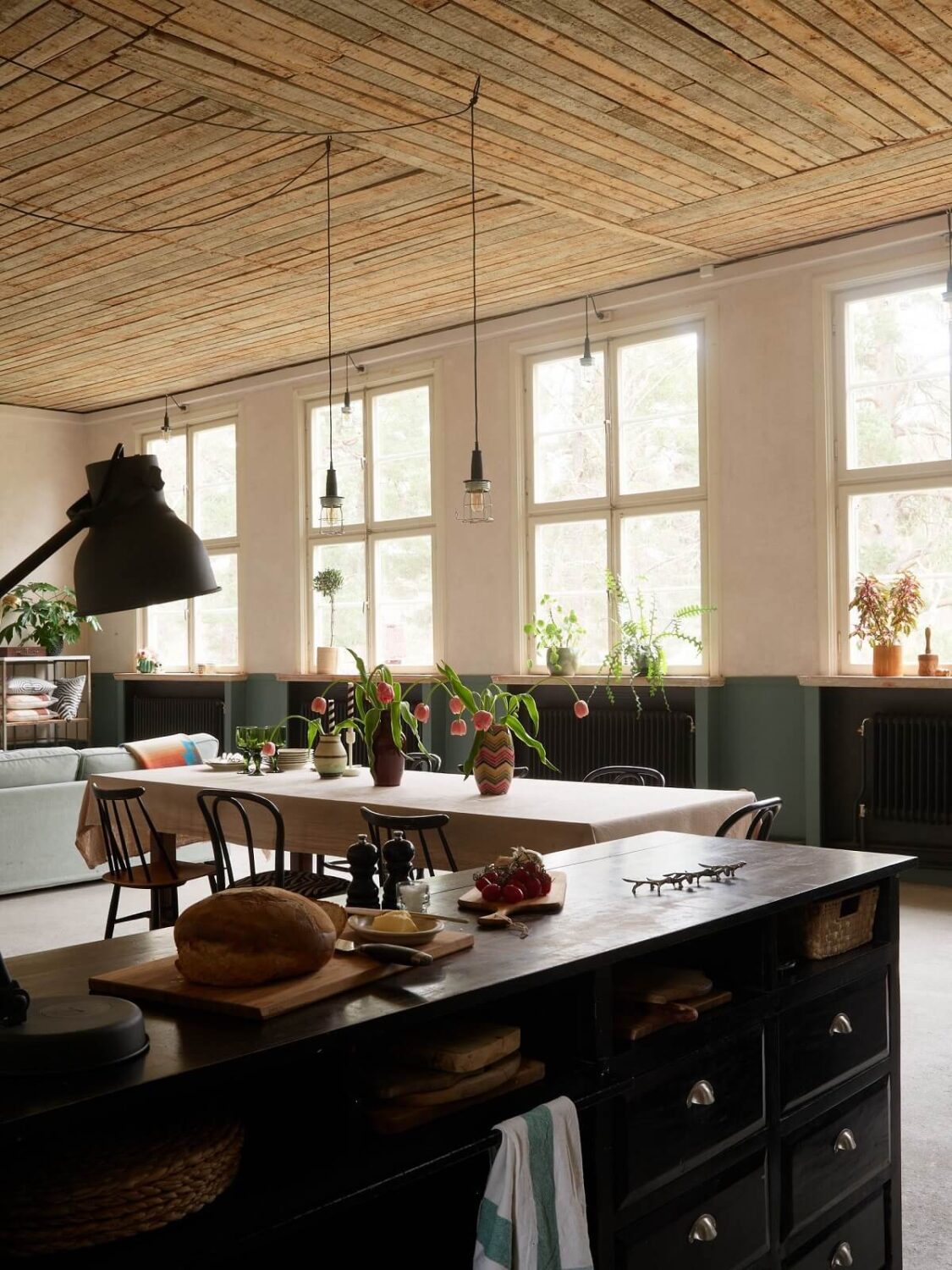 A Charming School Conversion in Sweden 8 black kitchen in school conversion