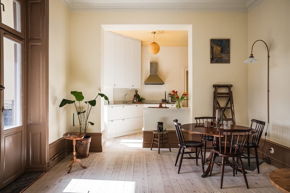 Warm Color Tones in a Scandinavian Apartment 1 brown skirting open plan living space