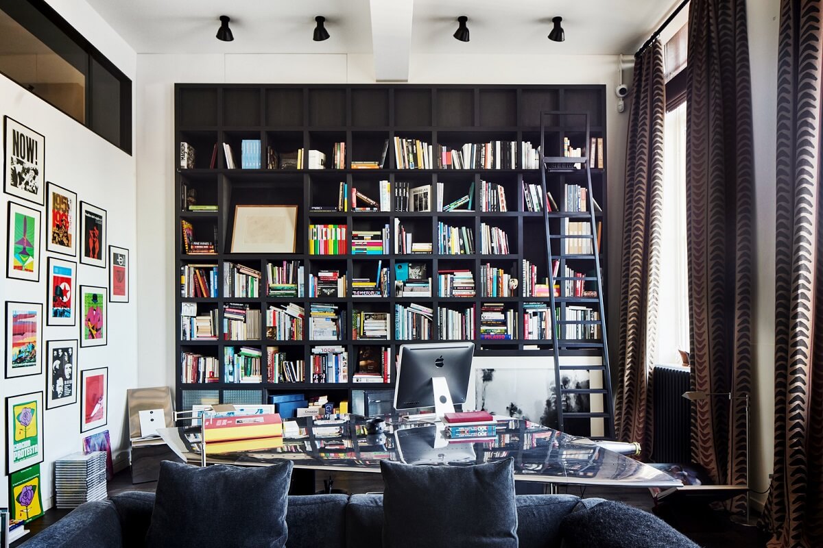 A Monochrome London Loft Filled with Art 18 floor to ceiling bookcases monochrome loft apartment london nordroom
