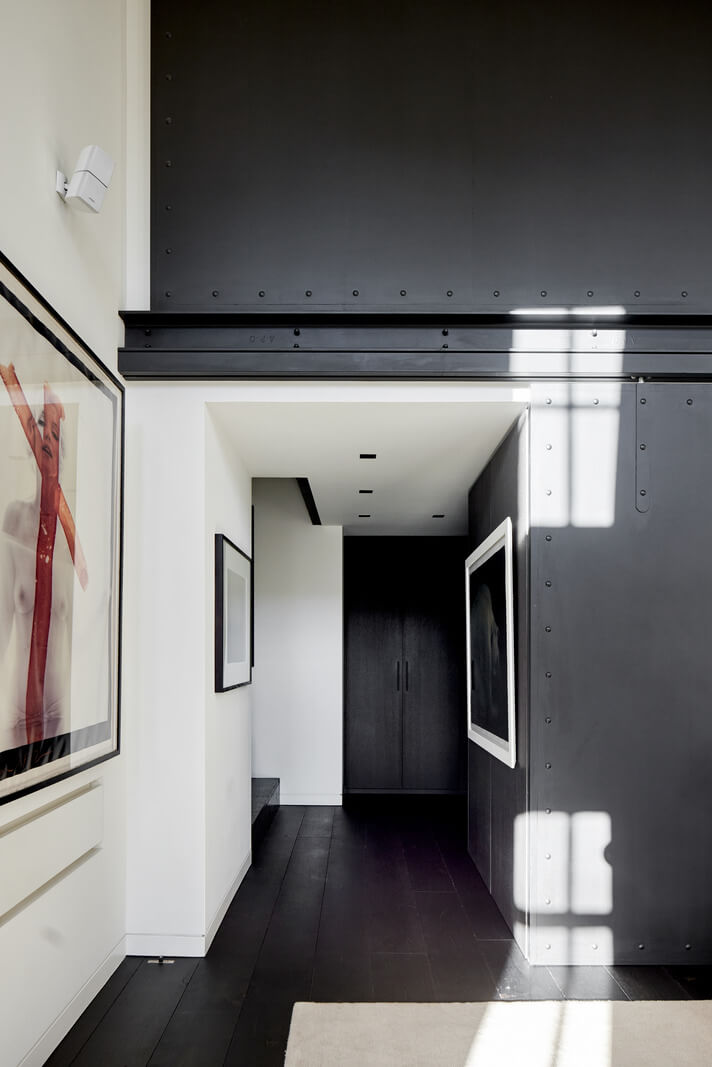 A Monochrome London Loft Filled with Art 15 hallway monochrome loft apartment london nordroom